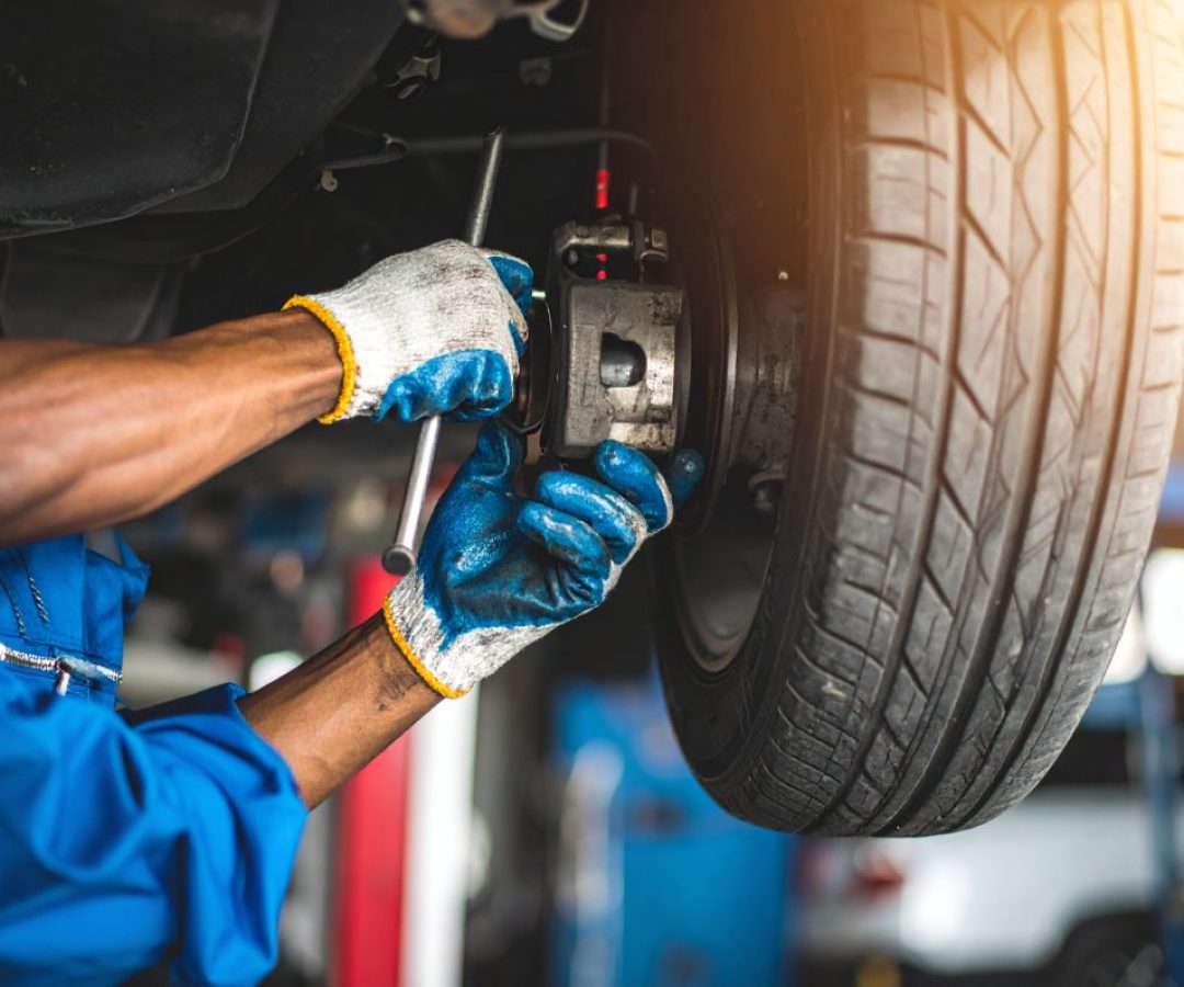 Firefly_Hyper-realistic-close-up-of-an-African-male-technician-in-clean-blue-overalls-repairi-773905-1024x796